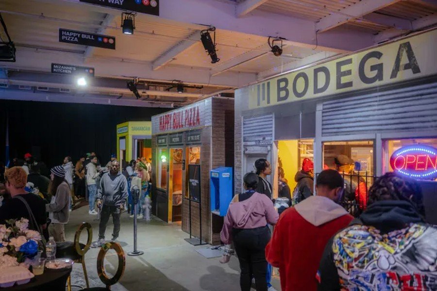 Attendees move through the food hall